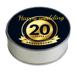 Round metal box with anniversary label in black and gold numbers
